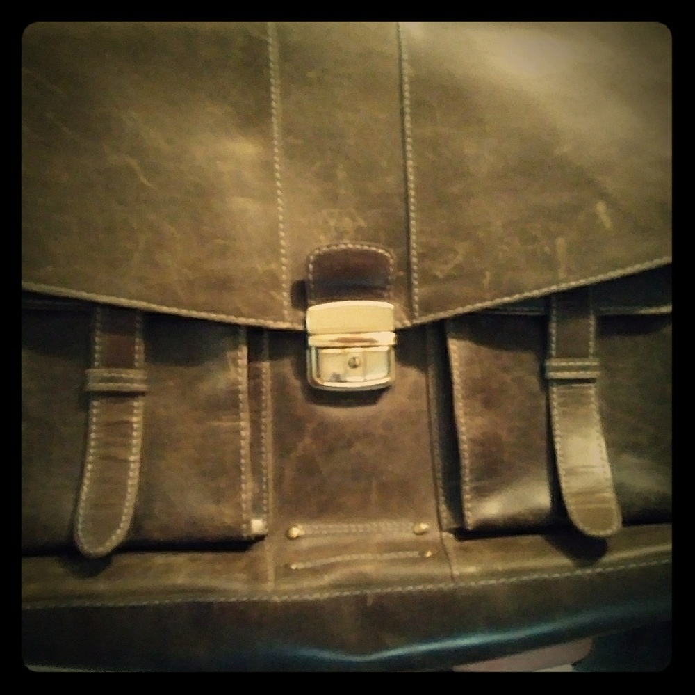 Used brown Naj-oleari briefcase.